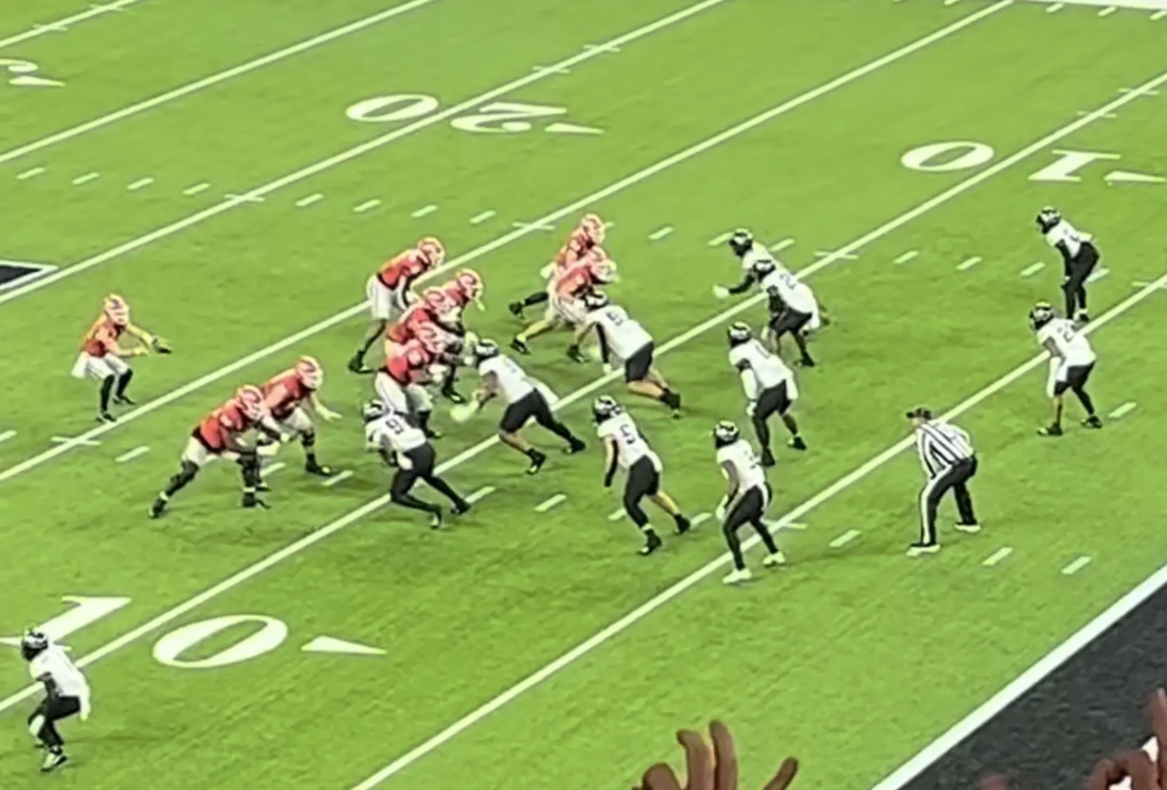 International tackle football game in progress