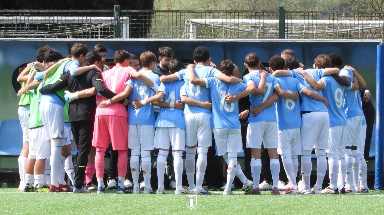 SS Lazio players gathered in a team huddle
