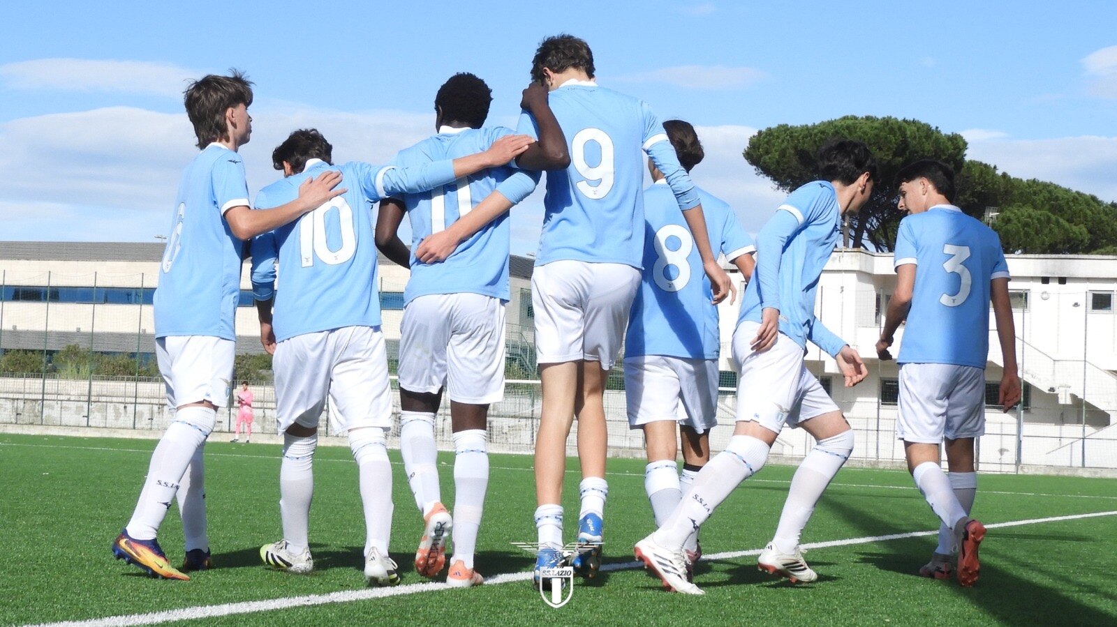 SS Lazio youth players walking onto the training field